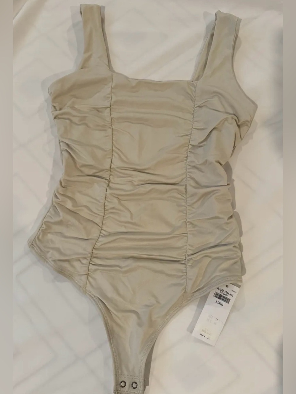 Abercrombie champagne bodysuit. New with tags.